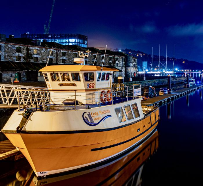 Cork: 2-Hour Guided Cork Harbour Scenic Cruise - Boarding the bright orange boat