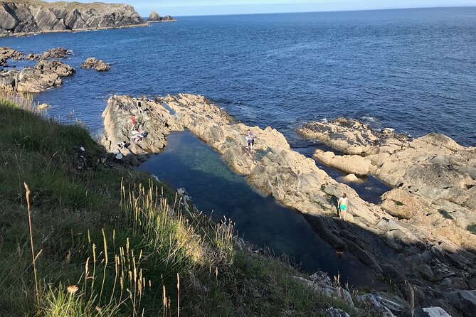 Toe Head Clifftop Hike in West Cork - The EIRE sign and a local Iron Age fort